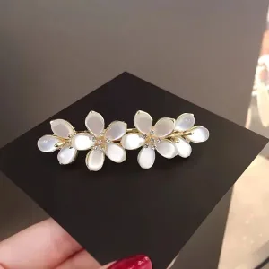barrette fleurs blanches